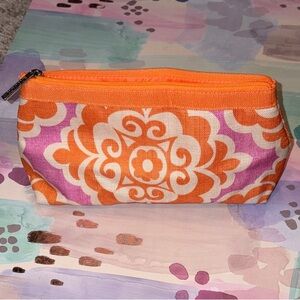 Clinique pink and orange makeup bag